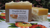 Pumpkin Pie Soap has real pumpkin in it, and is orange with white soap "whipping cream"on top.
